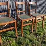 Set of four wooden bistro chairs, green seat, mid-20th century.