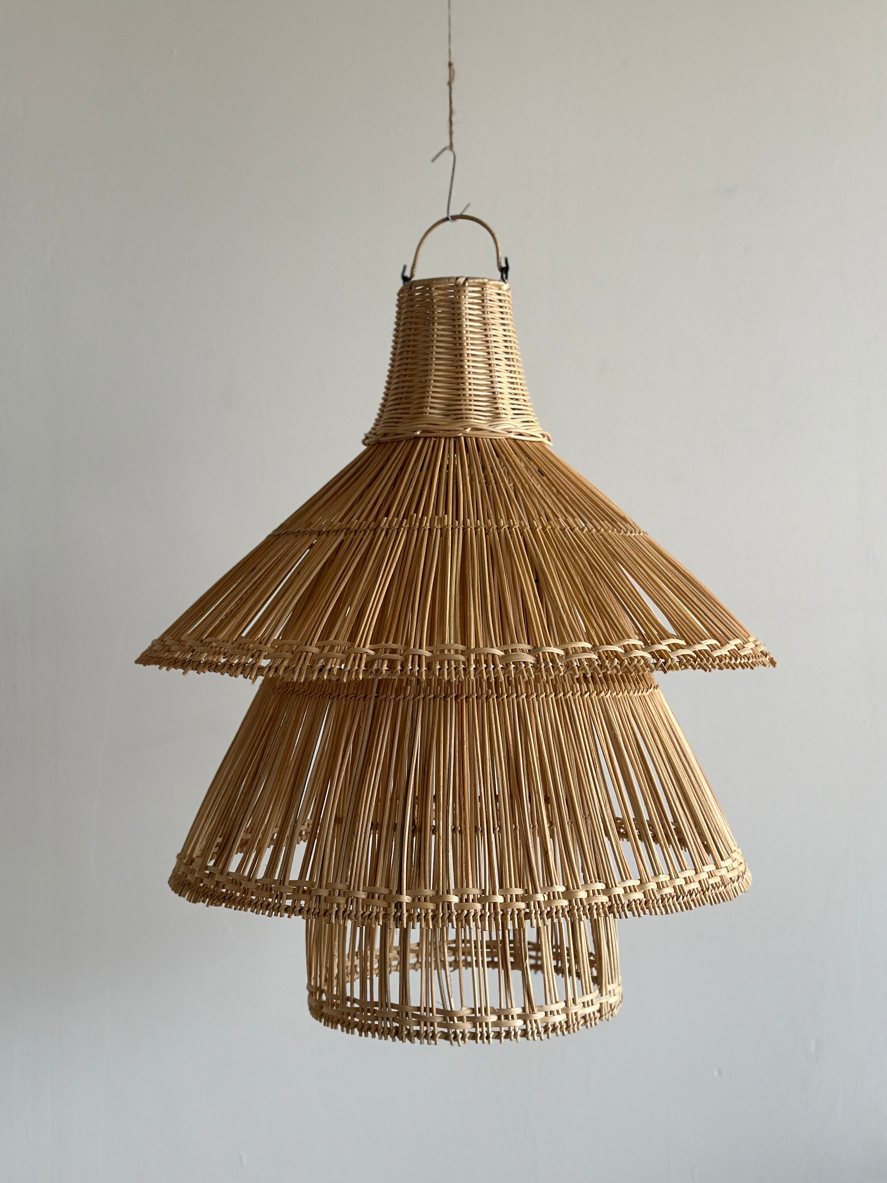 Rattan pendant lamp or light in the shape of an Asian lantern