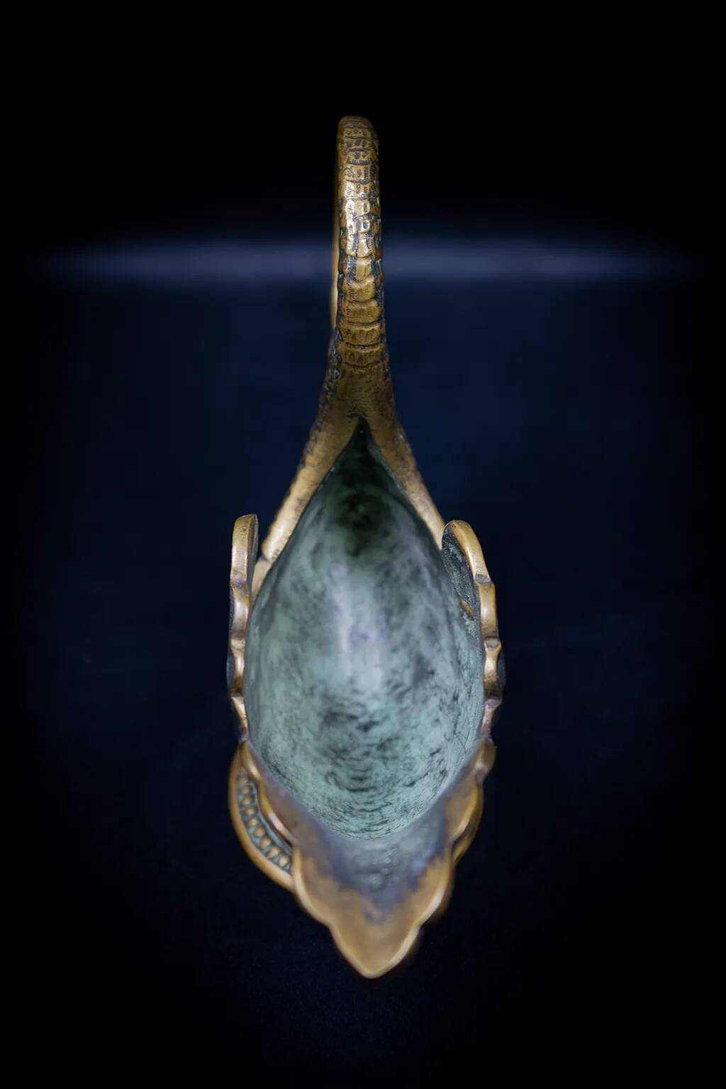 Bronze patinated pocket emptier with swan decoration by Max Le Verrier.