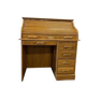 Vintage American wooden desk with a roll-top.