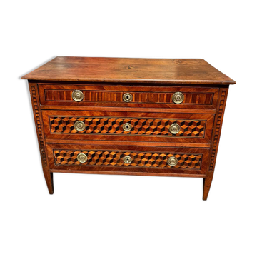 Louis XVI commode with marquetry featuring a design of precious wood cubes, 18th century.
