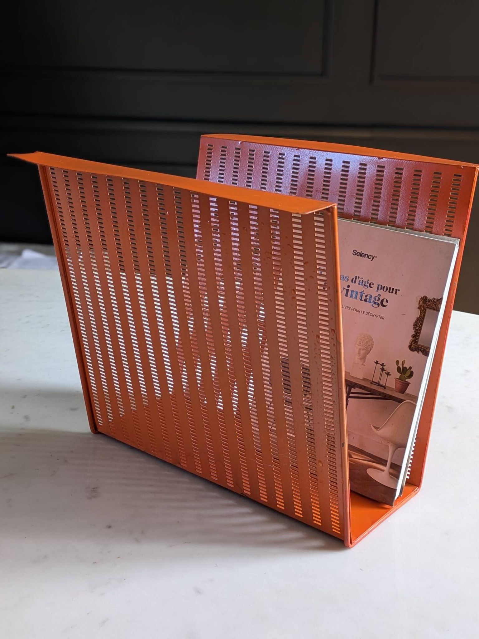 Vintage metal magazine rack in perforated orange/Mathieu Mategot style/70s