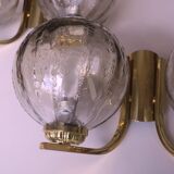 Mid century pair of brass and glass double wall lights, 1970s