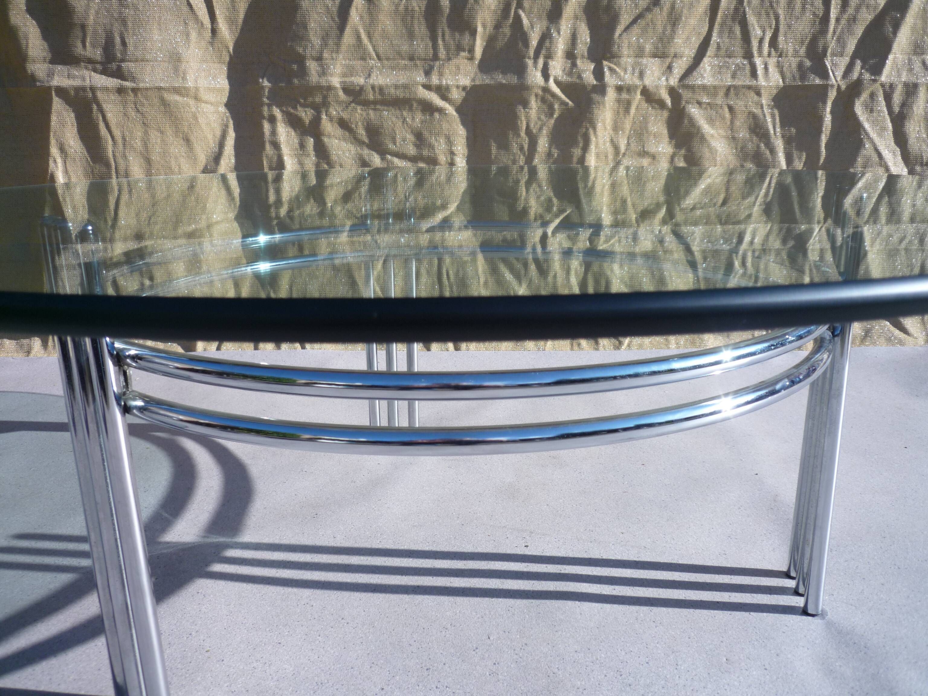 Chrome and glass tripod coffee table