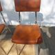 3 chaises vintage en inox et simili-cuir marron