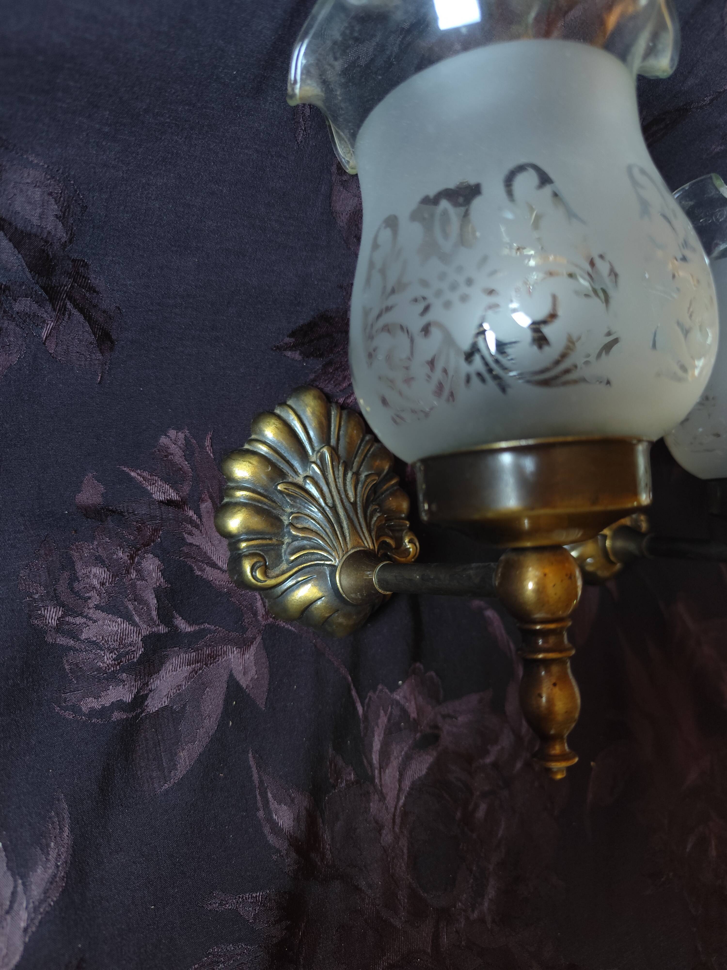 Pair of wall sconces in bronze with opaline glass tulips.