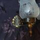 Pair of wall sconces in bronze with opaline glass tulips.