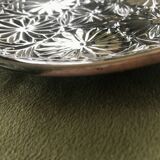 Small decorative chiseled ceramic plate