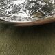Small decorative chiseled ceramic plate