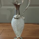 Old ewer in crystal and silver metal