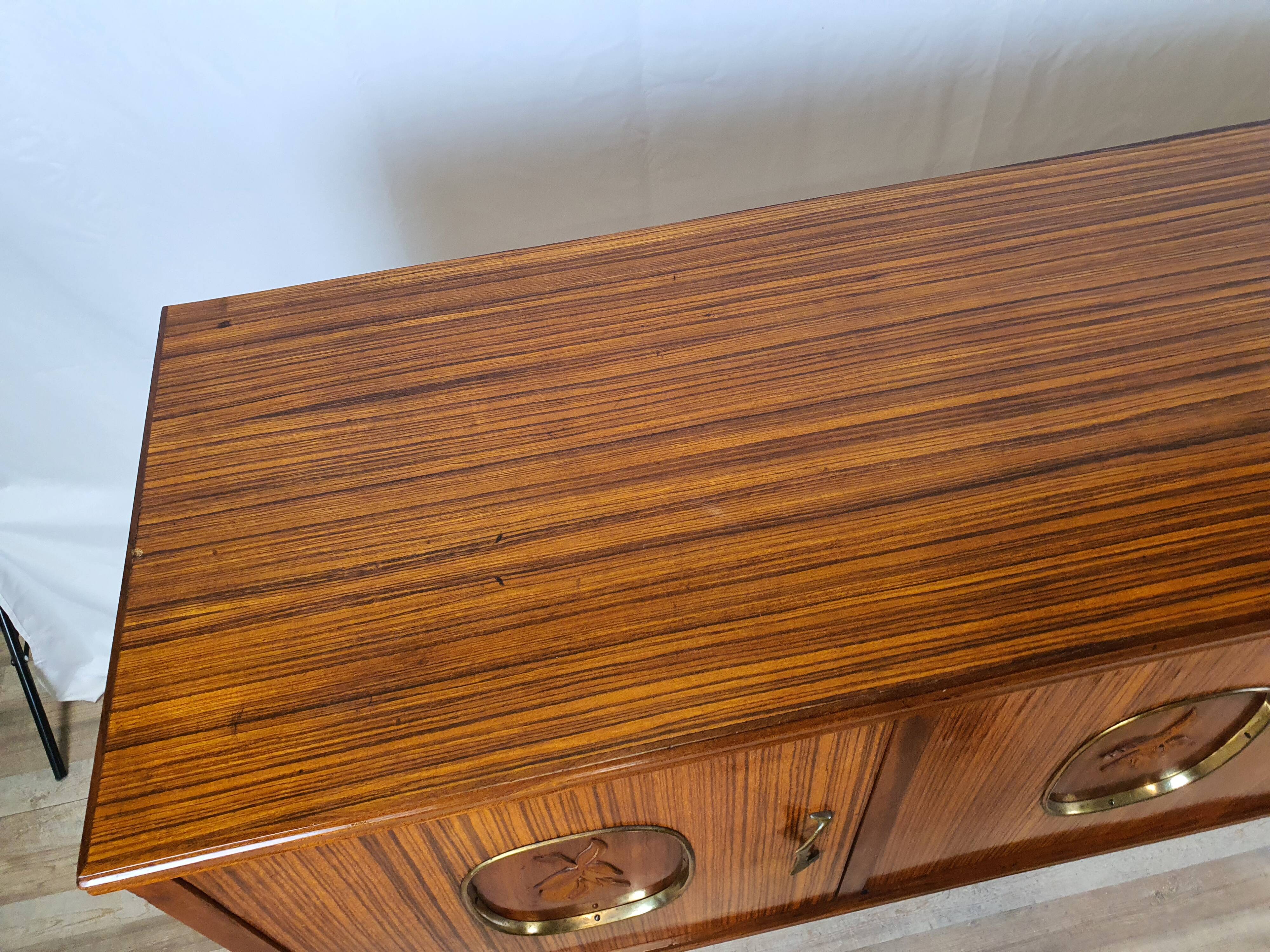 1960s sideboard with decorated doors in wood and brass