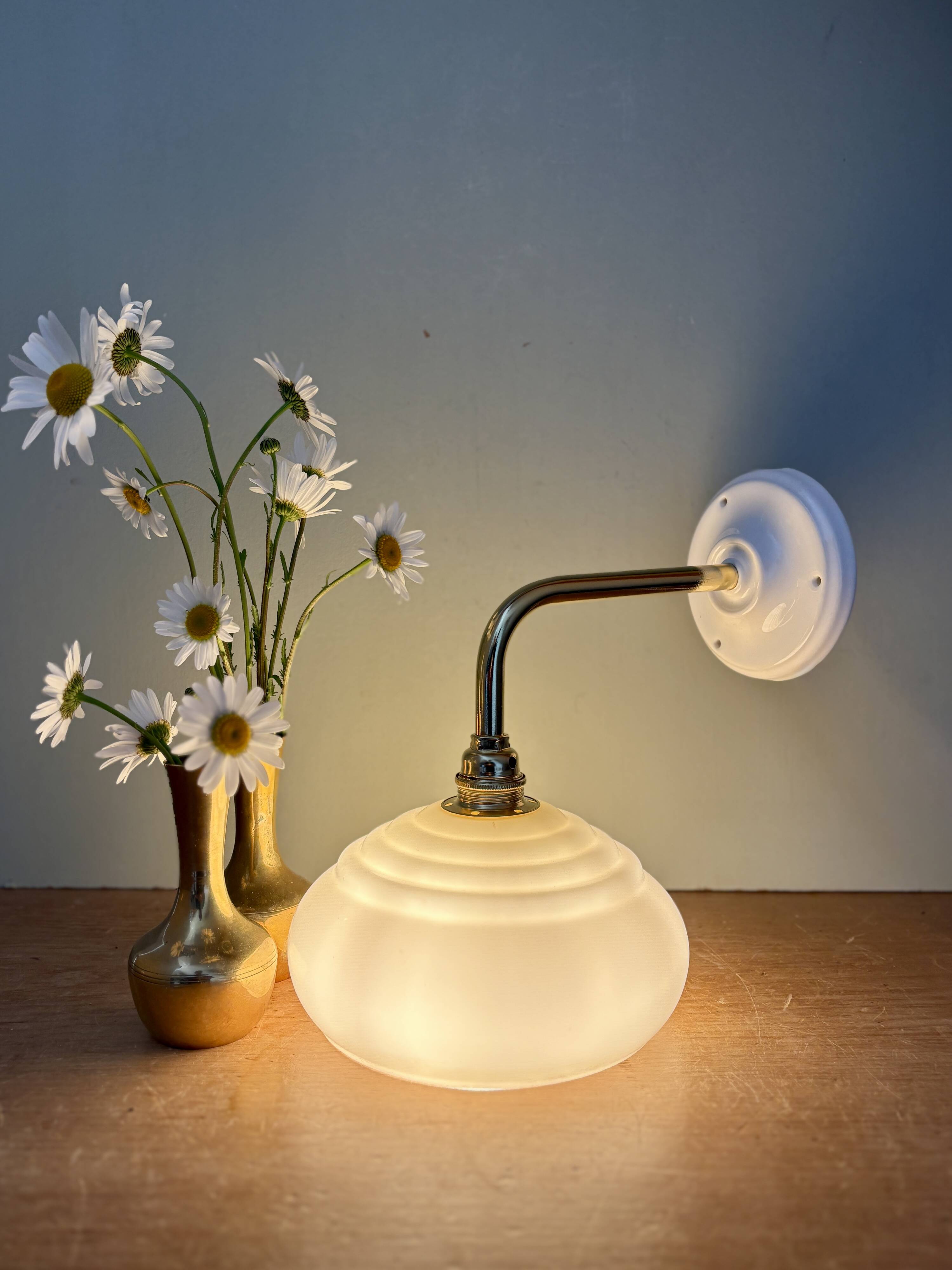 Vintage angled wall lamp with pale yellow opaline shade