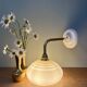 Vintage angled wall lamp with pale yellow opaline shade