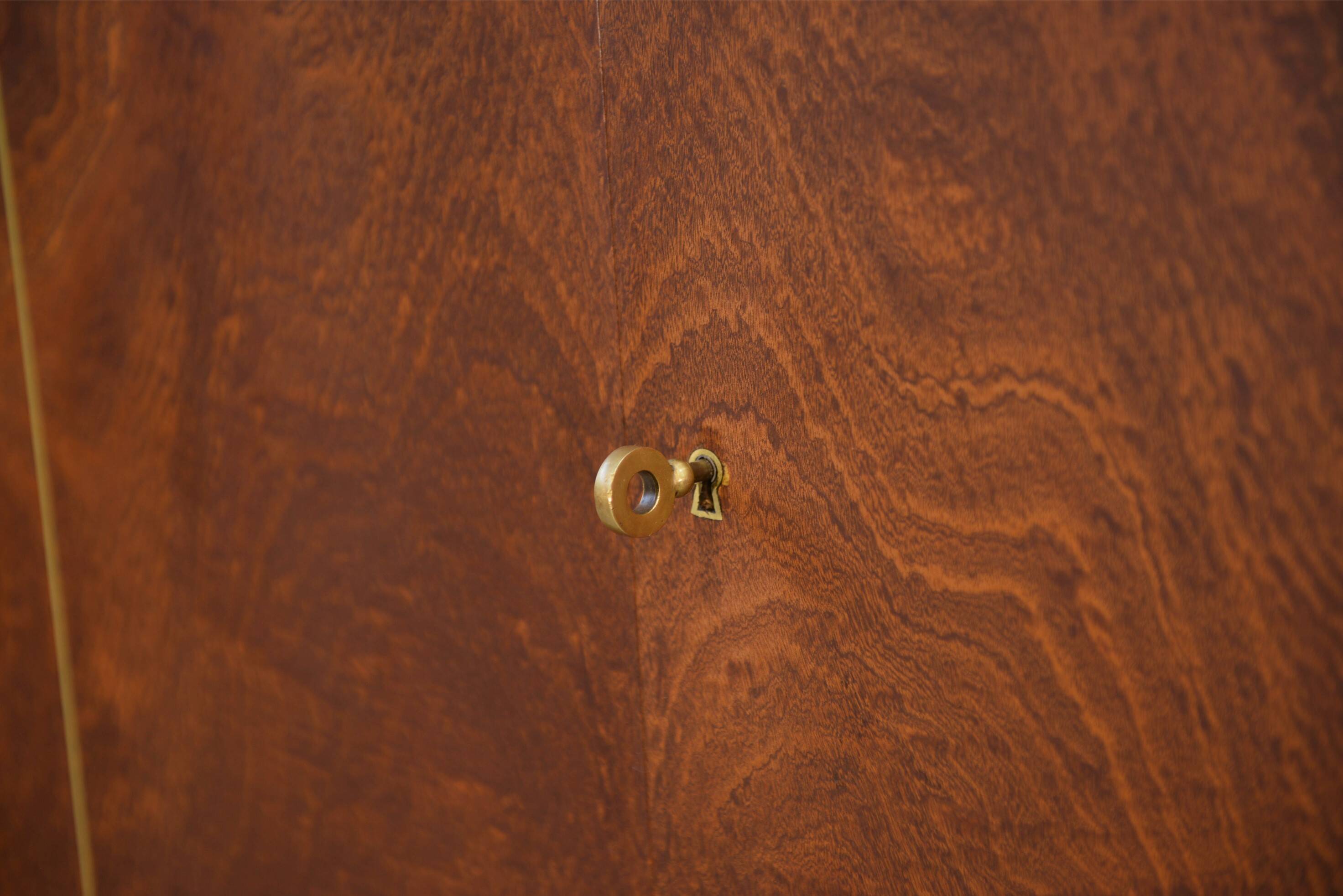 Art Deco mahogany wardrobe, signed A. Bicchierini, 1940s.