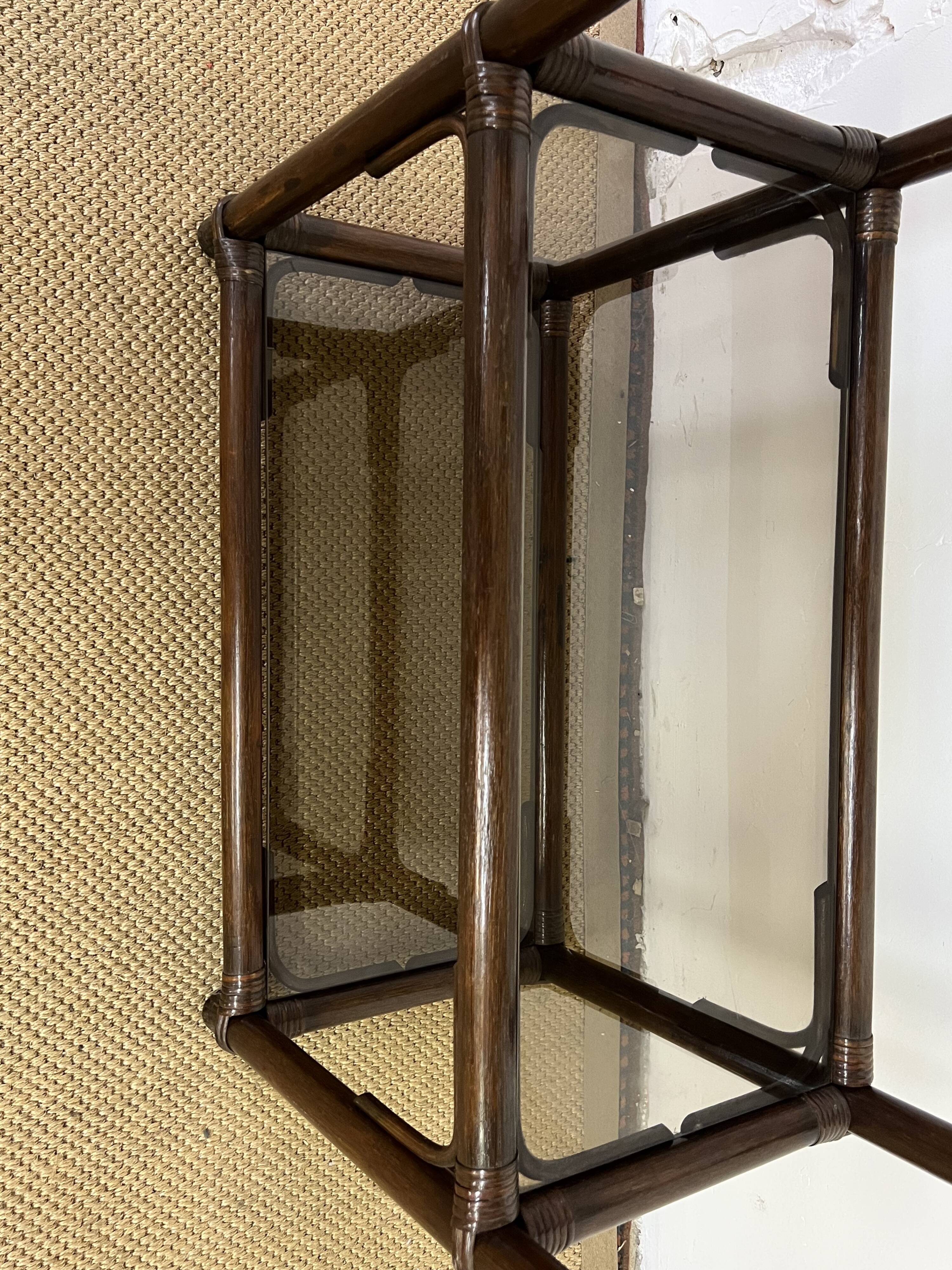 Rattan and smoked glass bookcase shelf