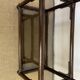 Rattan and smoked glass bookcase shelf