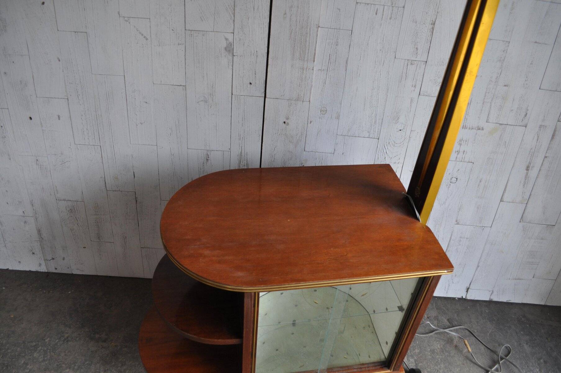 Illuminated cocktail cabinet in brown walnut and brass, multicoloured lampshades, 1950s.