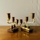Pair of Art Deco candlesticks in gilded brass and wood