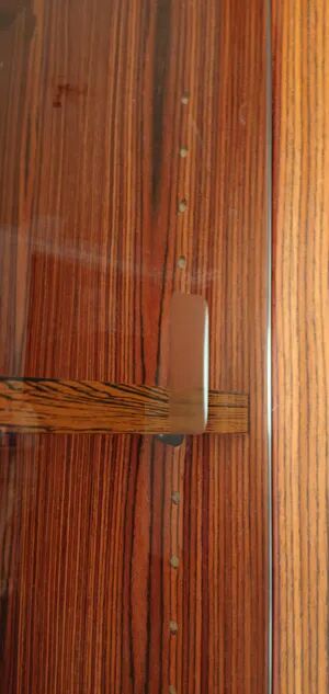 Enfilade wall vitrine in veneered teak from the 1960s.