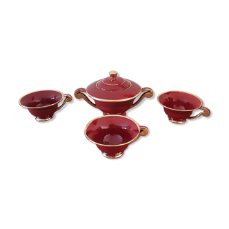 Tea, coffee and sugar cups made of red and gold porcelain