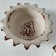 Duo of handmade beige and terracotta earthenware empty pockets