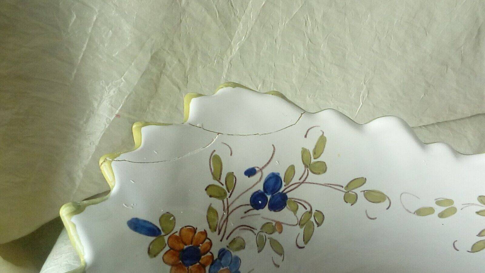 Moustiers earthenware planter with ram's head