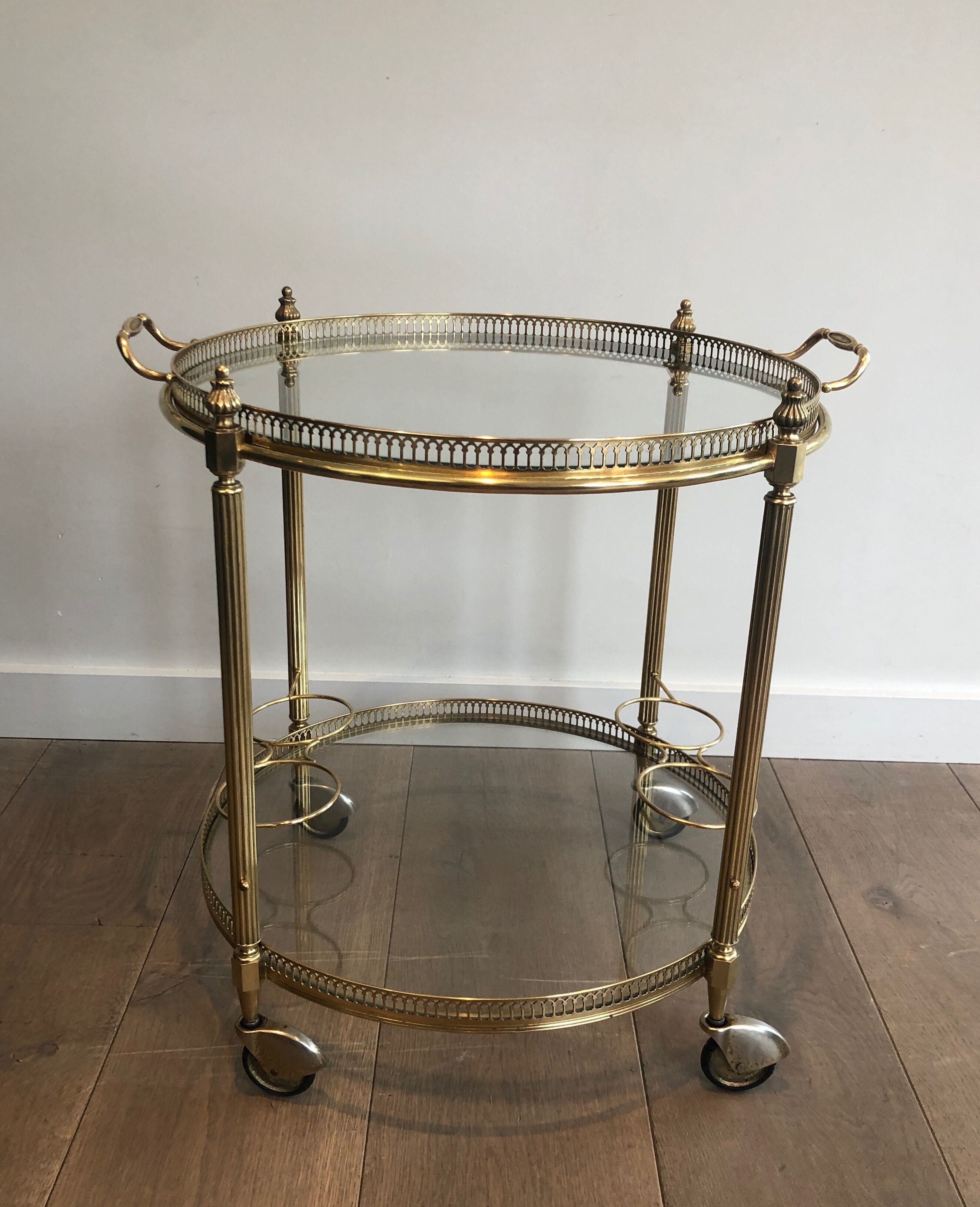 Neoclassical style rolling table in brass