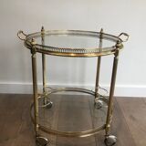Neoclassical style rolling table in brass