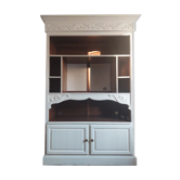 Library cabinet with moldings and scrolls
