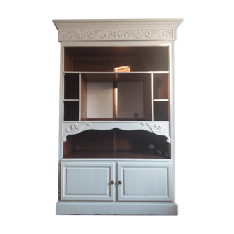 Library cabinet with moldings and scrolls
