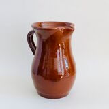 Vintage pitcher in glazed earth