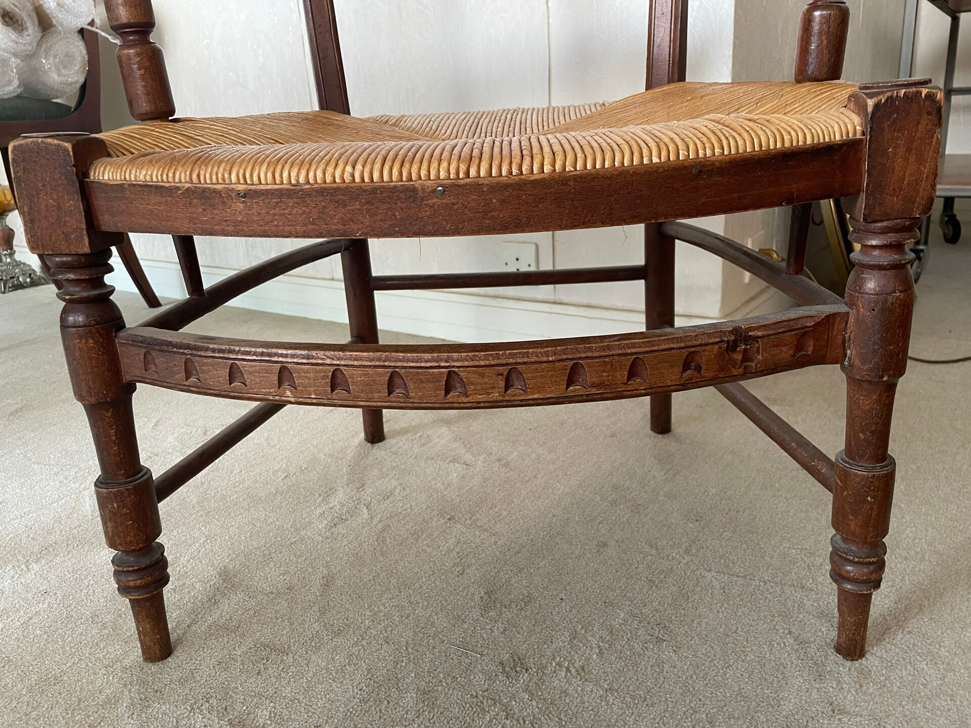 Antique ladderback chair, very high backrest, rush seat.