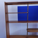 Library separator of 60s teak pieces