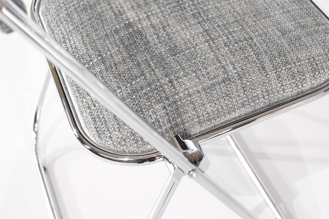Set of 9 chrome folding chairs with fabric from the 1970s.
