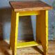 Art-populaire workshop stool in patinated wood