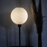 Table lamp with a lampshade from an old vintage pendant light in ribbed white glass and a pi