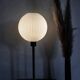 Table lamp with a lampshade from an old vintage pendant light in ribbed white glass and a pi