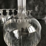 11 glasses and 1 wine carafe