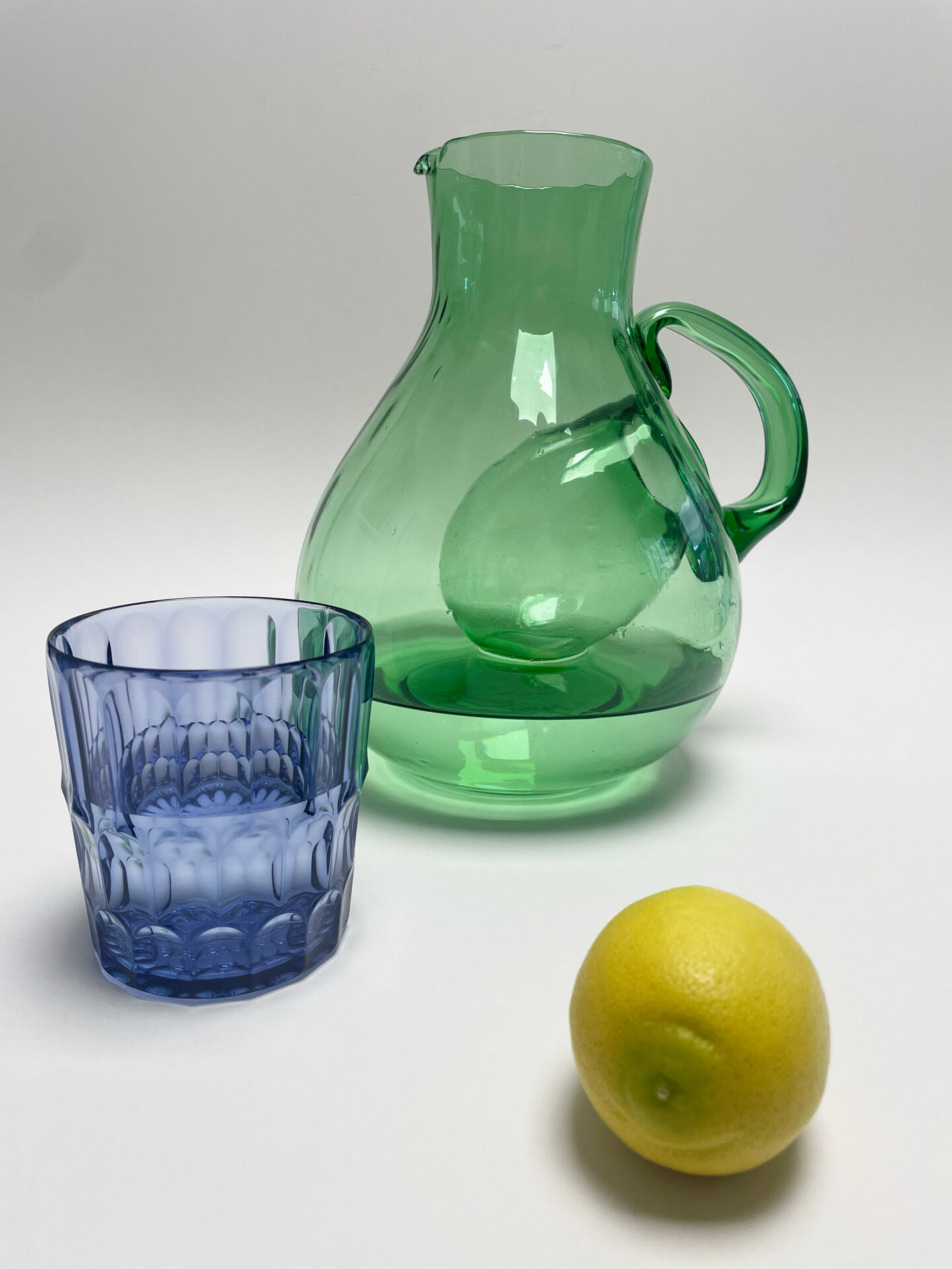 Large green glass cooling jug
