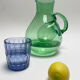 Large green glass cooling jug