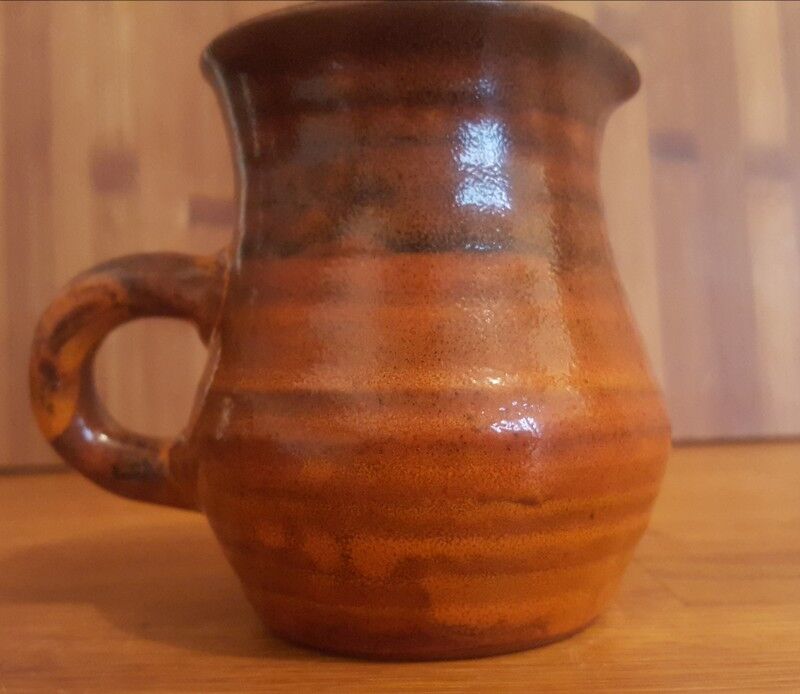 Ceramic milk pot creamer with orange glaze