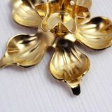 Pair of brass "flower" candlesticks