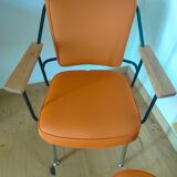 Two-matirere armchair with its footrest