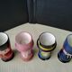 Set of 4 painted wooden characters eggcups