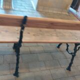 Antique garden bench with cast iron legs