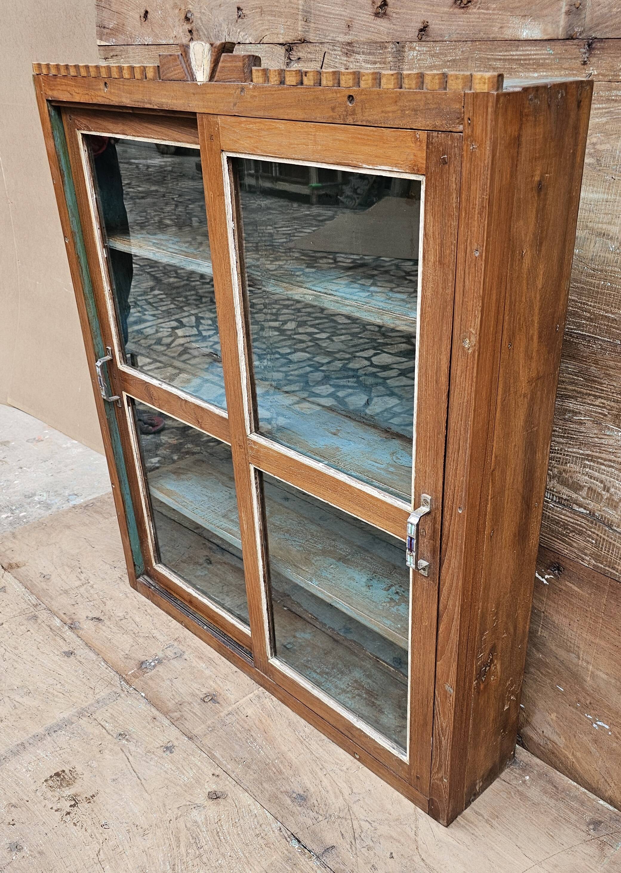 Old Art Deco display case in Burmese teak