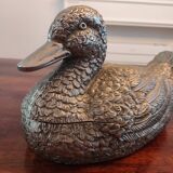Large silver metal duck