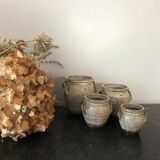 Set of 4 enamelled sandstone pots