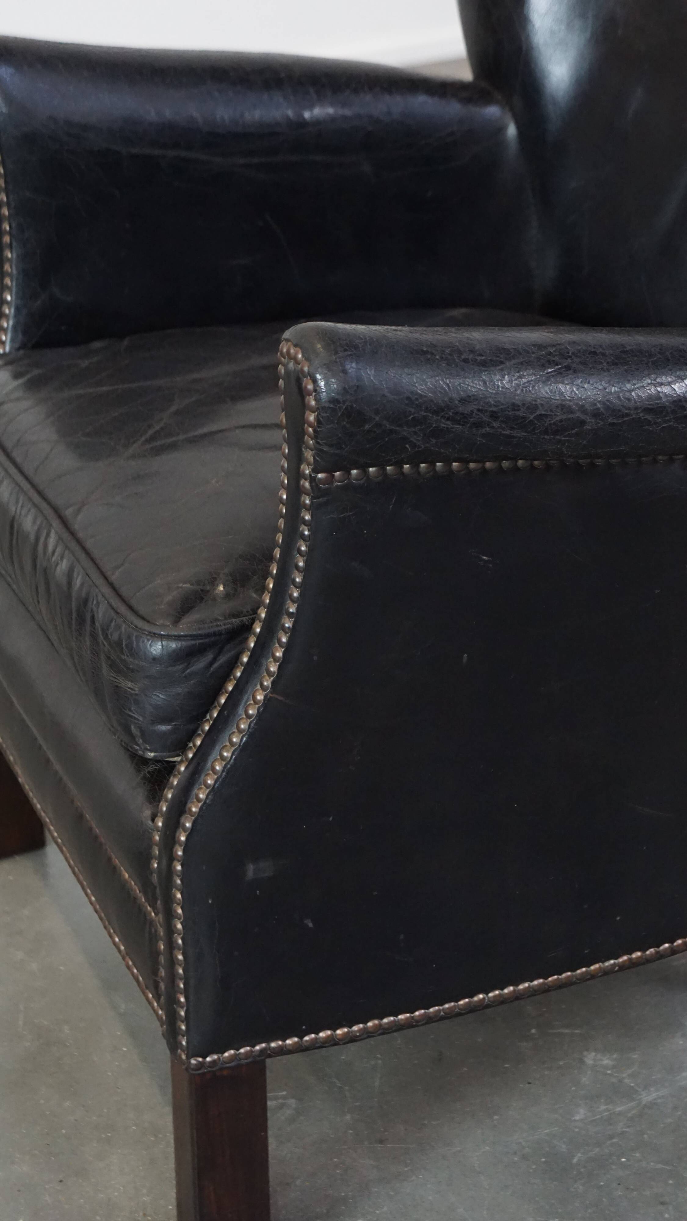 Fauteuil en cuir de vachette noir