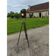 Spotlight on wooden and chrome tripod.